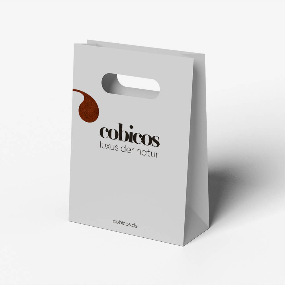 cobicos luxuriöse weiße, stabile Papiertasche mit Logo
